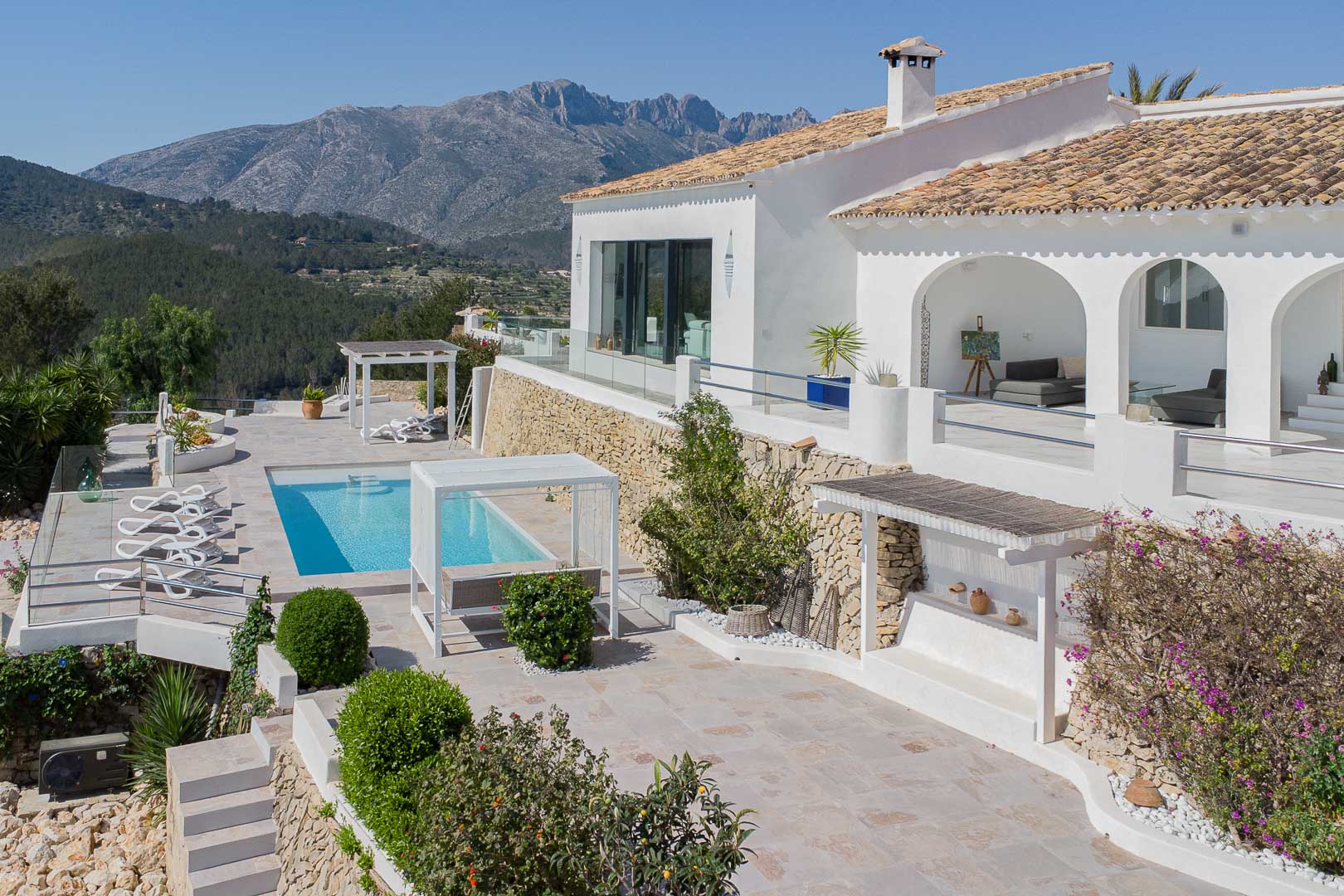 Terrace and pool with mountain views