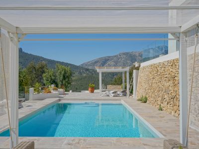 Pool terrace with mountain views