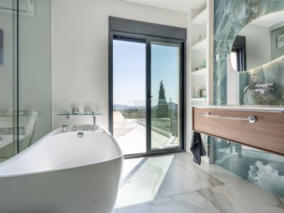 En-suite bathroom with terrace access