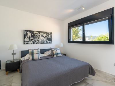 Bedroom with outdoor views