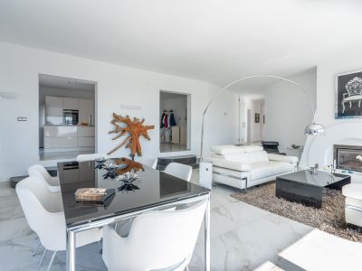 Living and dining area with fireplace