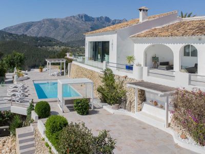 Terrace and pool with mountain views