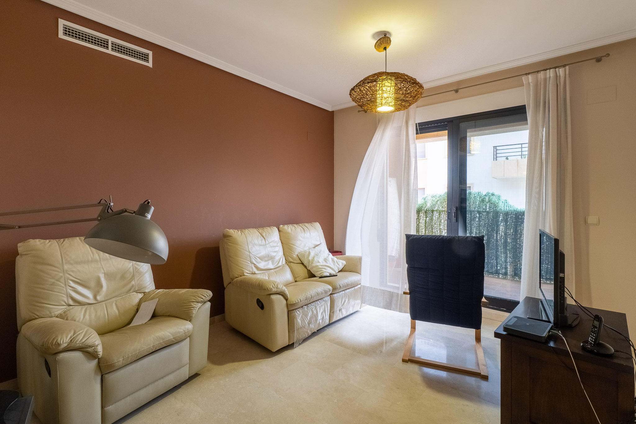 Living room with balcony access