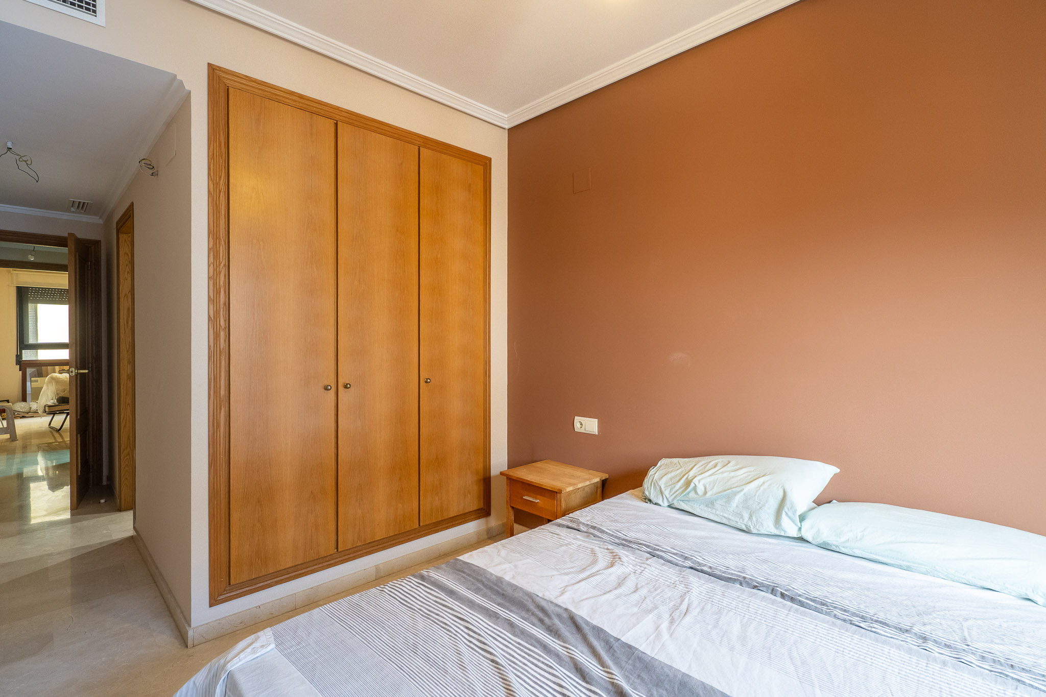 Bedroom with built-in wardrobe