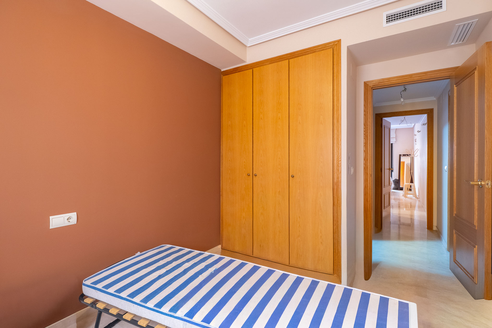 Bedroom with built-in wardrobe