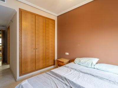 Bedroom with built-in wardrobe