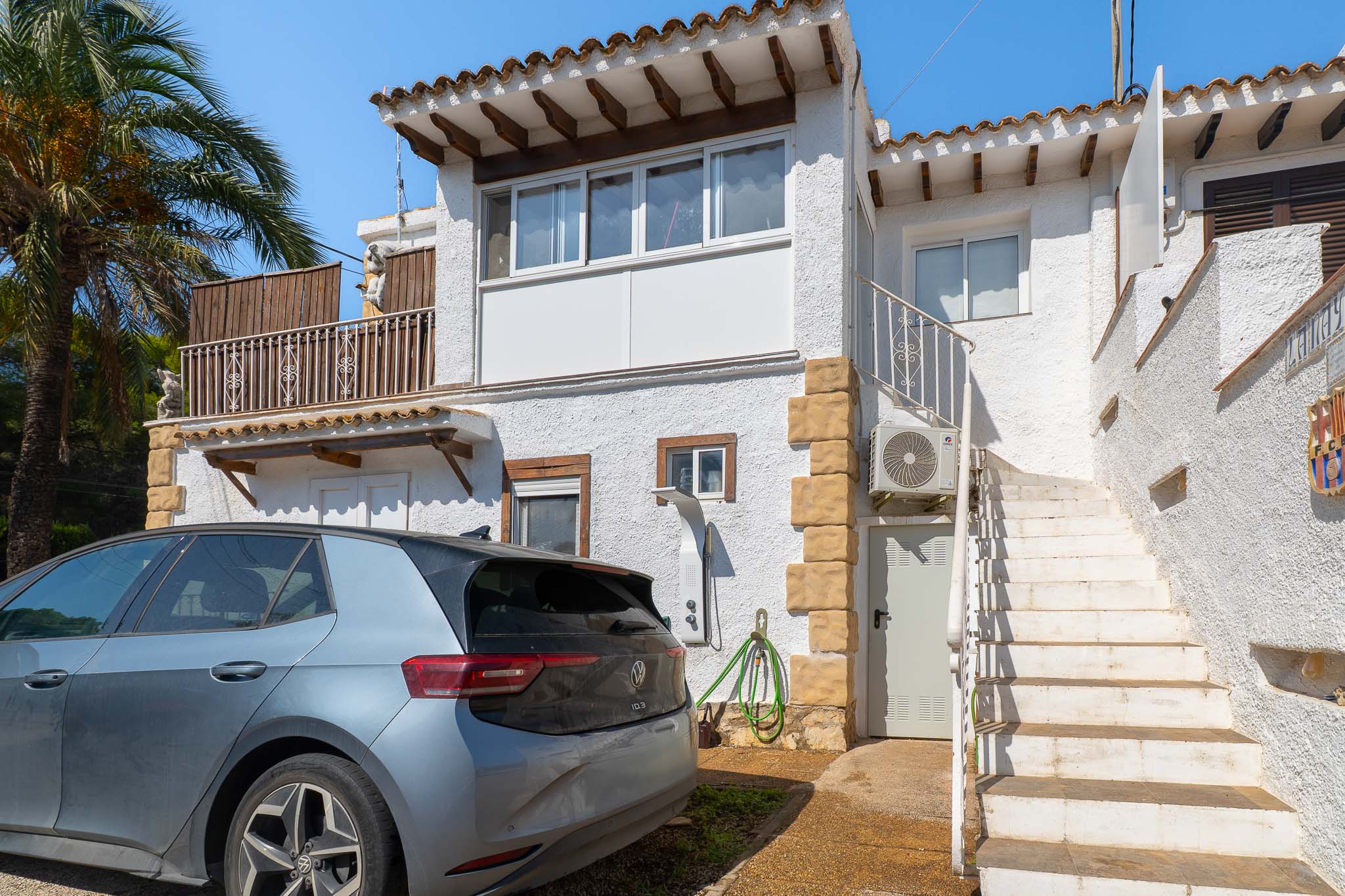 Front facade with entrance stairs