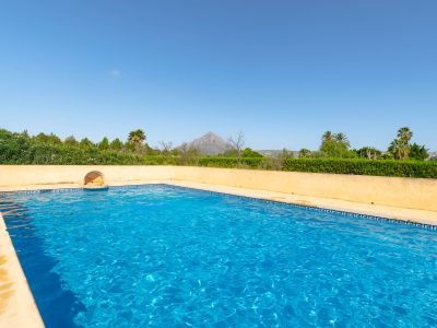 Communal pool with mountain views