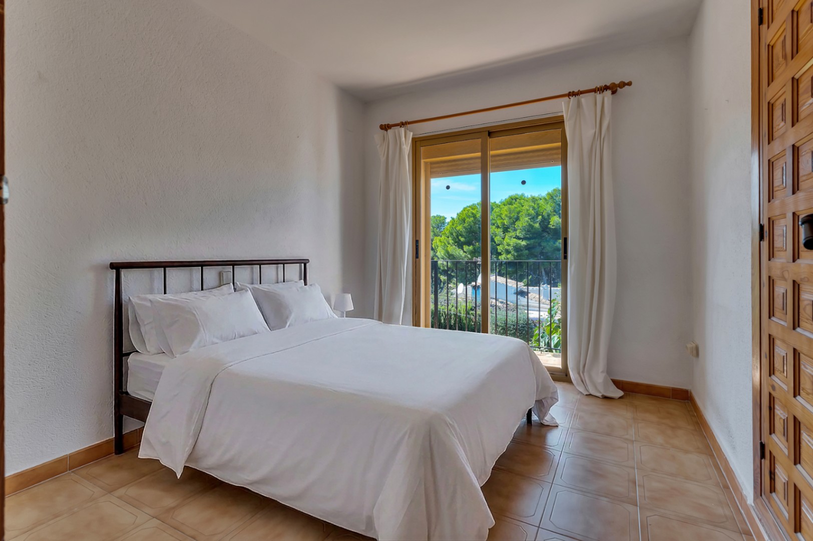 Bedroom with balcony