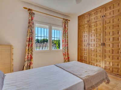Bedroom with built-in wardrobe
