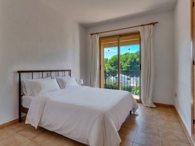 Bedroom with balcony