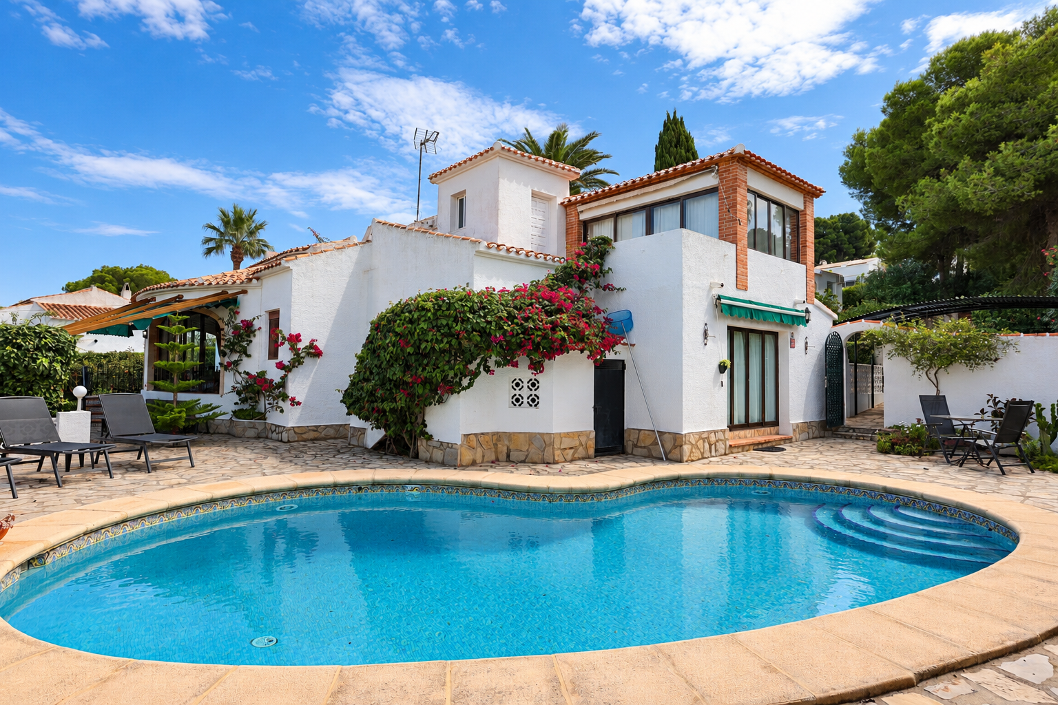 Swimming pool and villa exterior