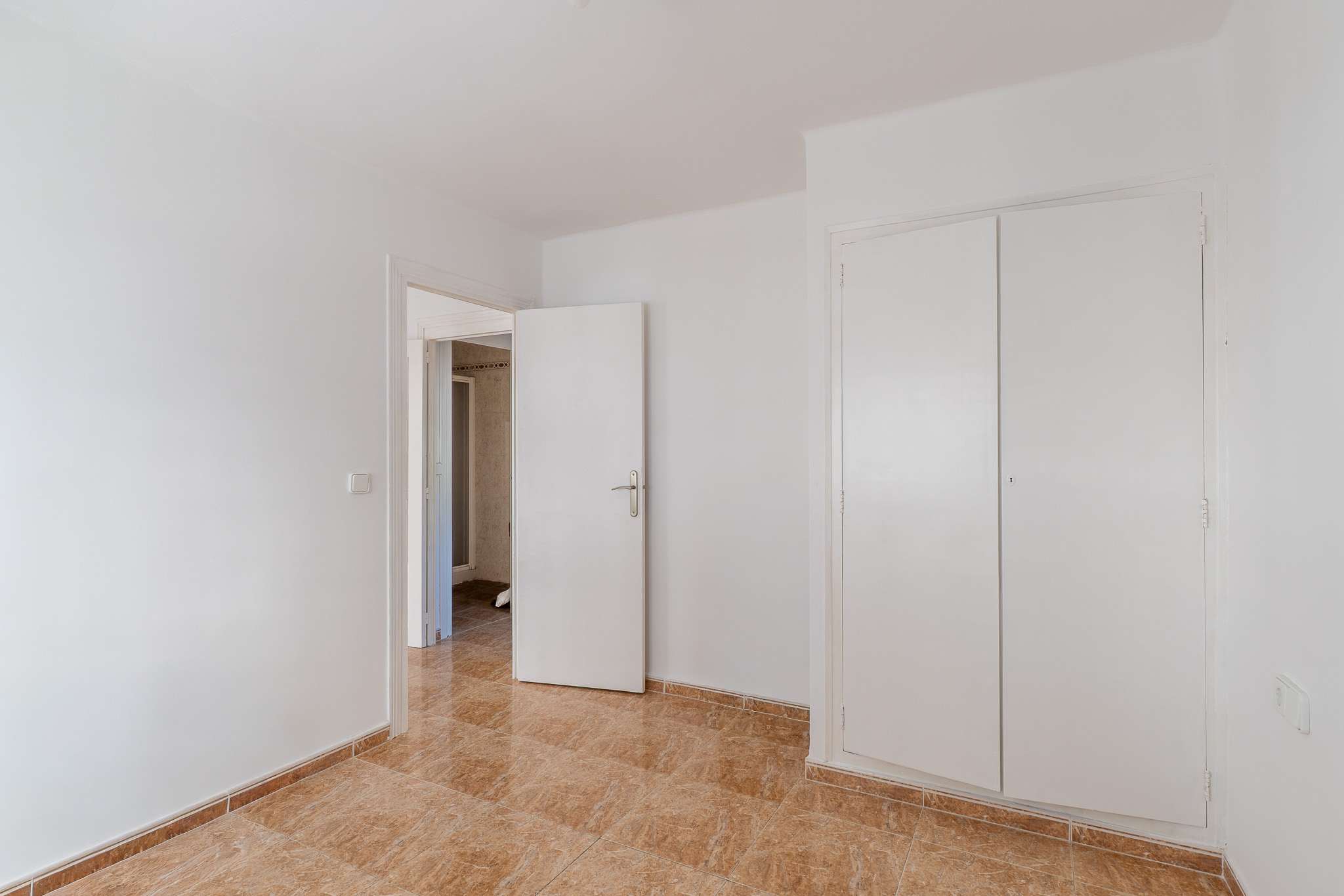 Bedroom with built-in wardrobe
