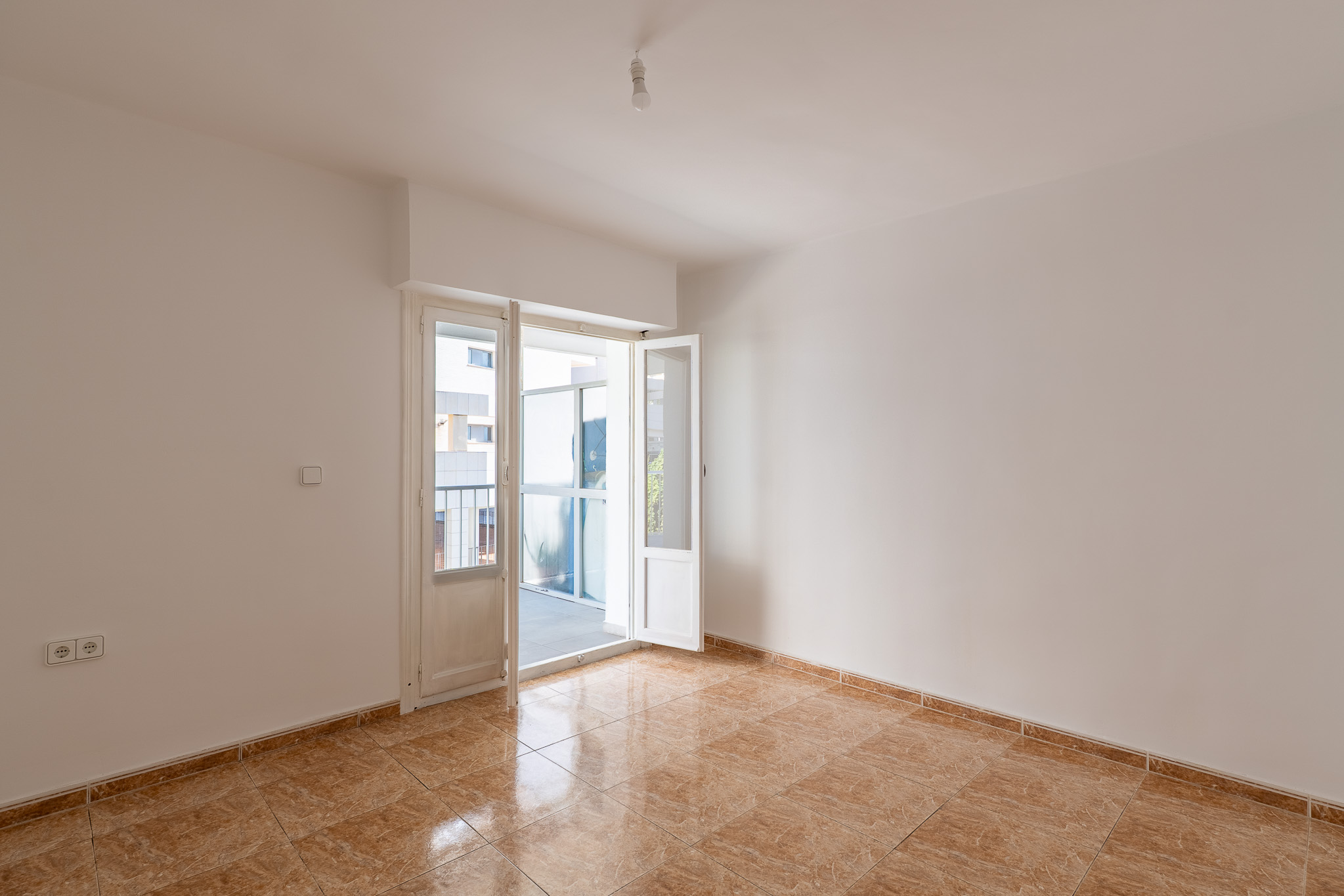 Living room with terrace access