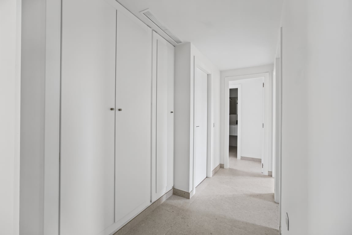 Hallway with built-in closets