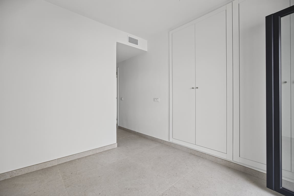 Bedroom with built-in wardrobes