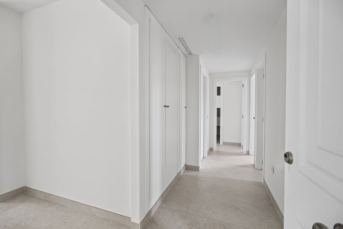 Hallway with built-in wardrobes