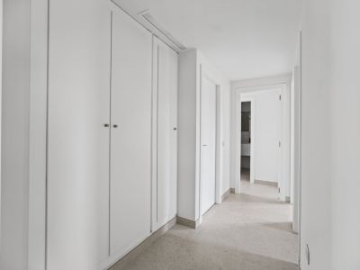 Hallway with built-in closets