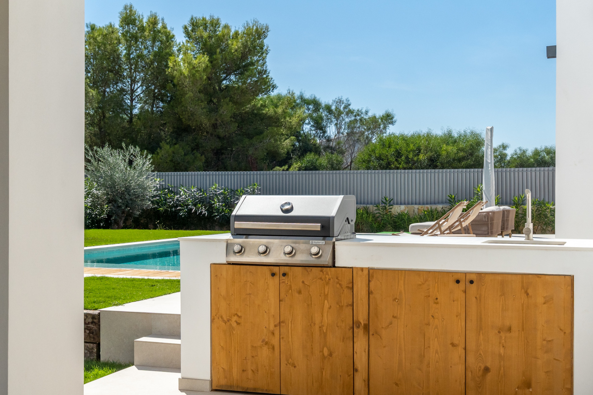 Outdoor kitchen and pool