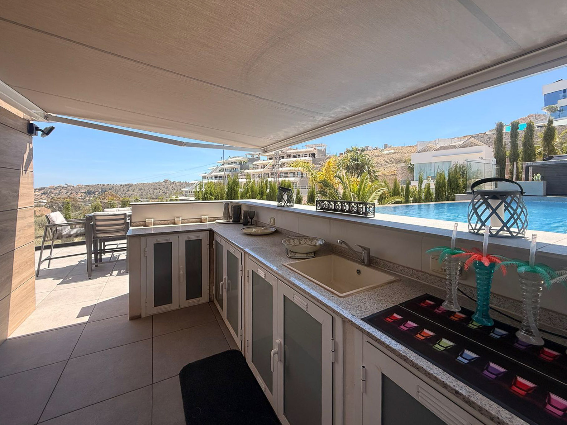 Outdoor kitchen by the pool