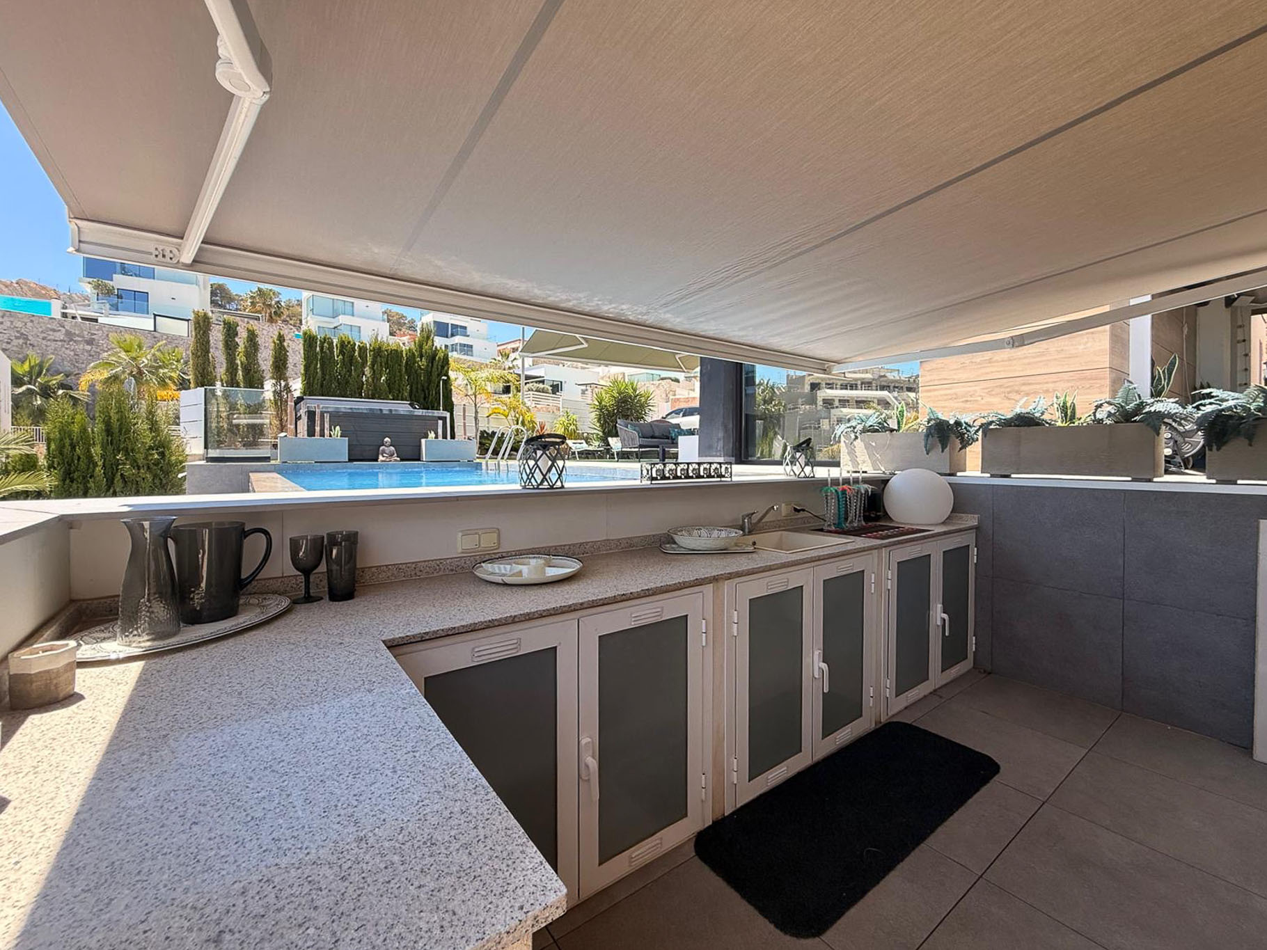 Outdoor kitchen and pool