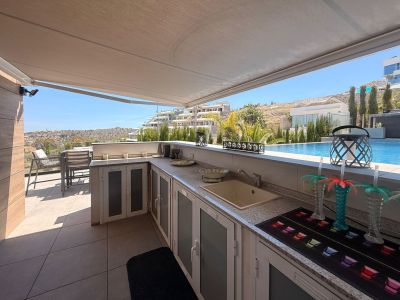 Outdoor kitchen by the pool