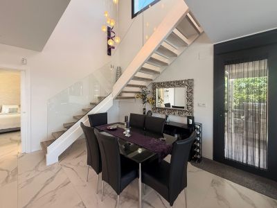 Dining area and interior staircase