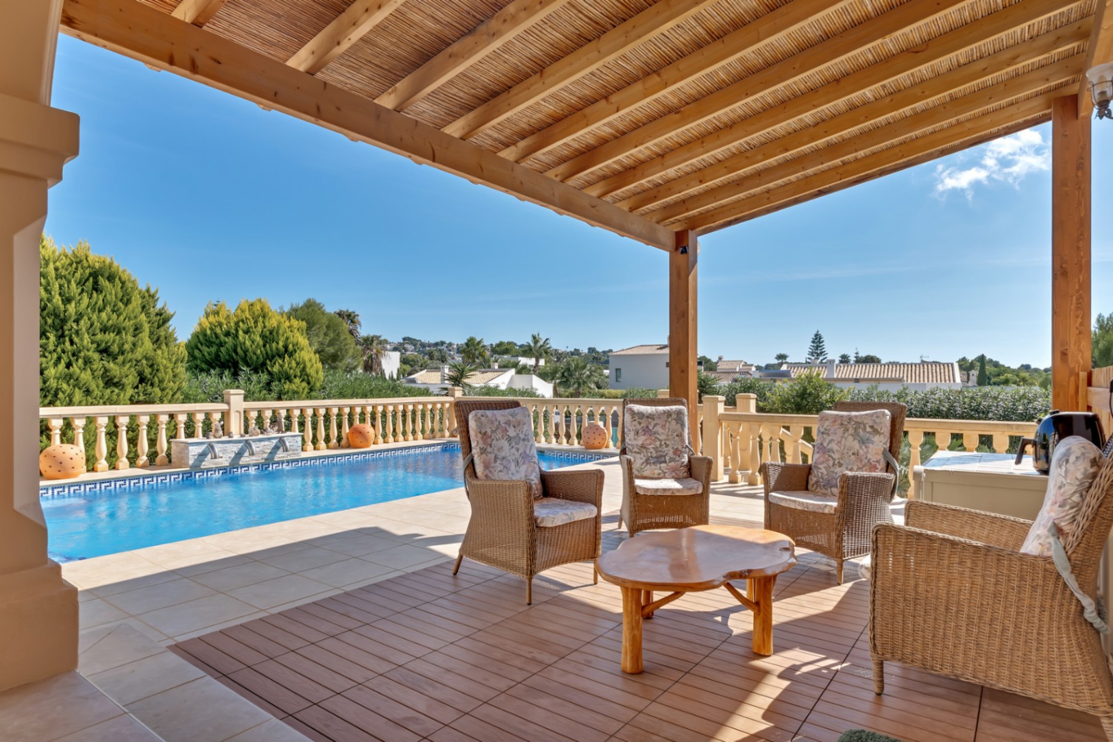 Covered terrace and swimming pool