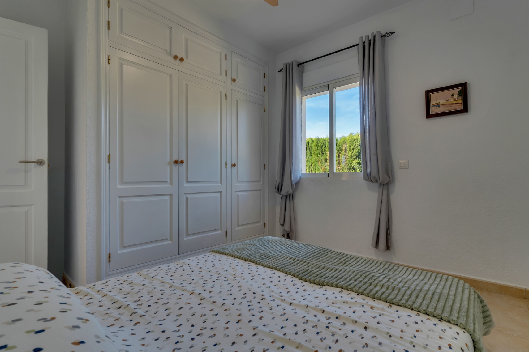 Bedroom with built-in wardrobes