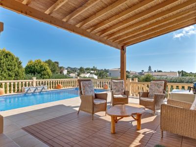 Covered terrace and swimming pool