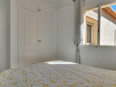 Bedroom with built-in wardrobe