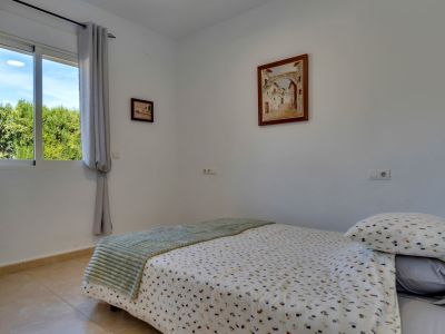 Bedroom with garden views