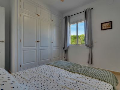 Bedroom with built-in wardrobes