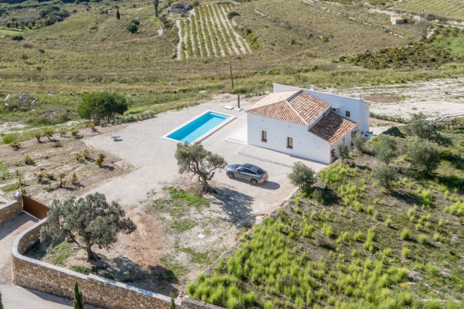 Aerial view of house and pool