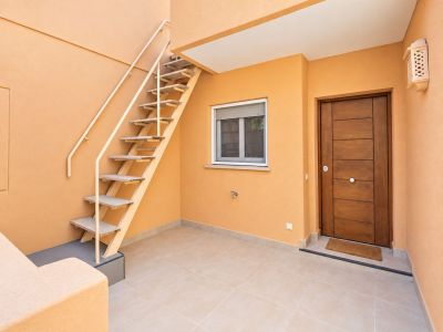 Entrance with exterior stairs