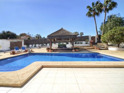Swimming pool and pergola