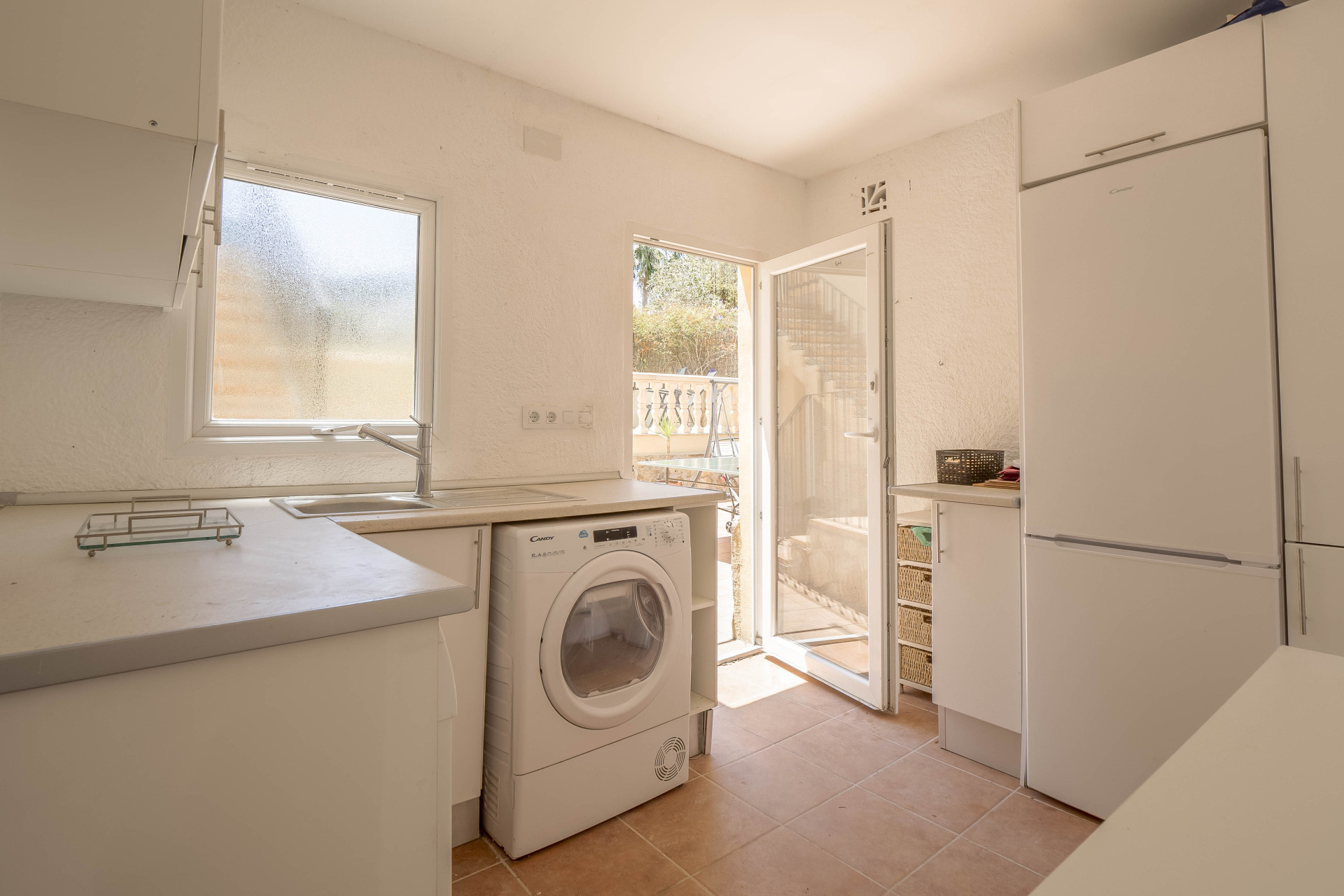 Laundry room with outdoor access