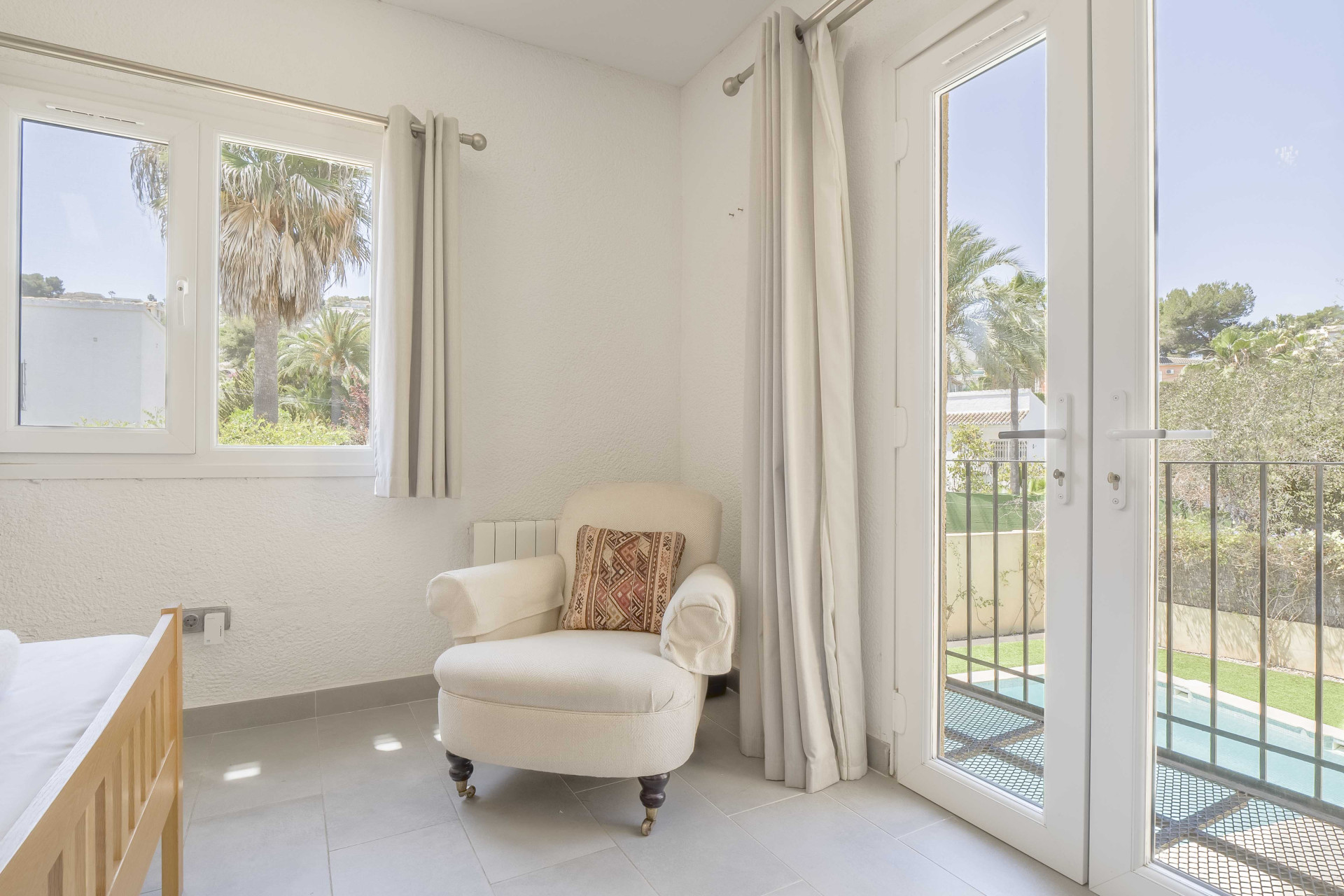Bedroom with pool view