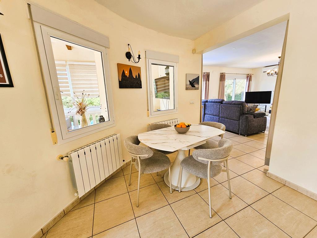 Dining area and living room