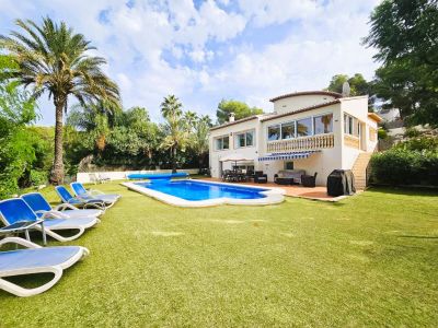 Exterior with garden and pool