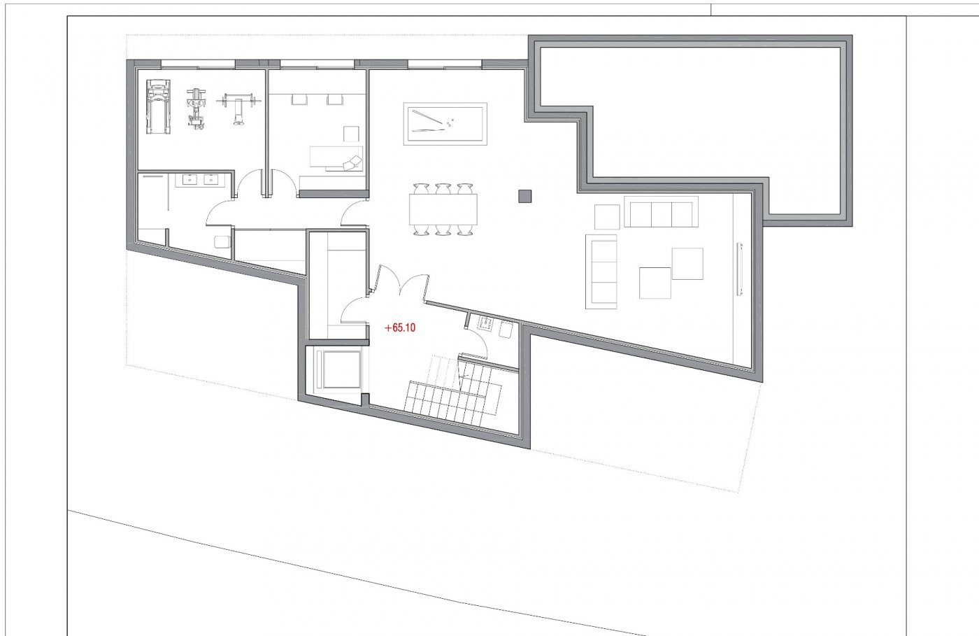 Architectural floor plan of the lower level featuring a private gym, guest suite, and a large entertainment area with a pool table and lounge.