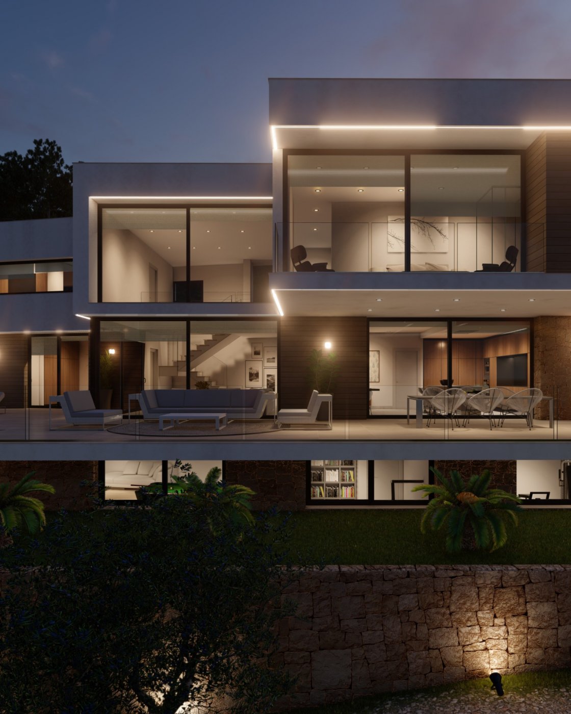 Modern villa facade at dusk featuring floor-to-ceiling glass, integrated LED strip lighting, a spacious terrace with lounge seating, and a lower-level stone wall.