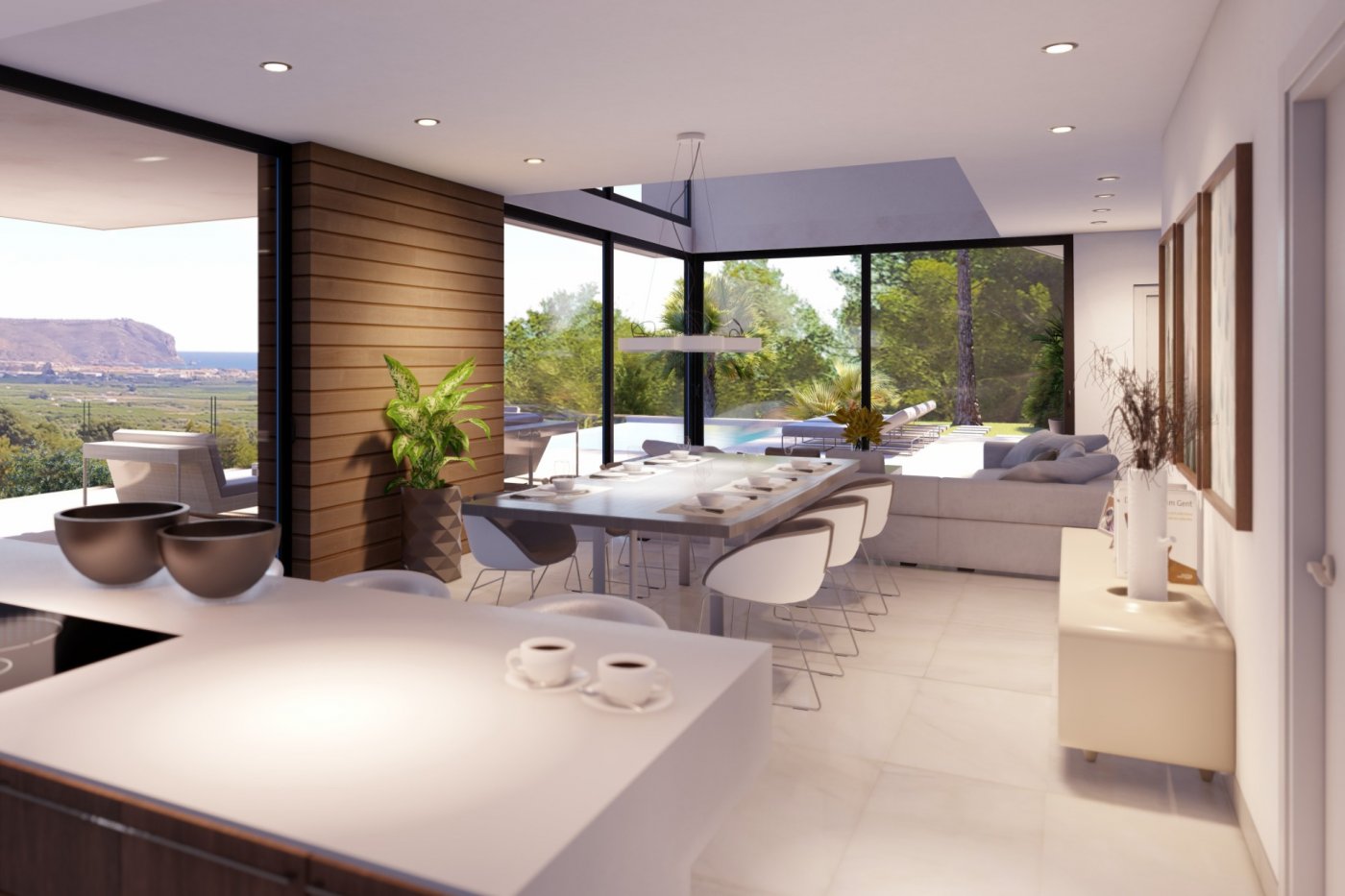 Open-plan dining area featuring a large table, wood-paneled accent wall, and floor-to-ceiling windows with views of the pool and distant mountains.