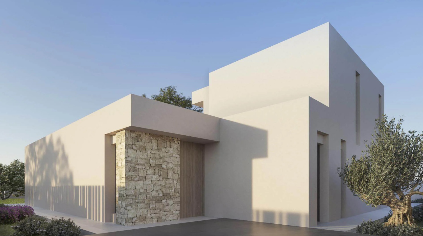 Exterior view of a contemporary villa showcasing minimalist white volumes, a dry stone feature wall, and a vertical wood-paneled entrance.