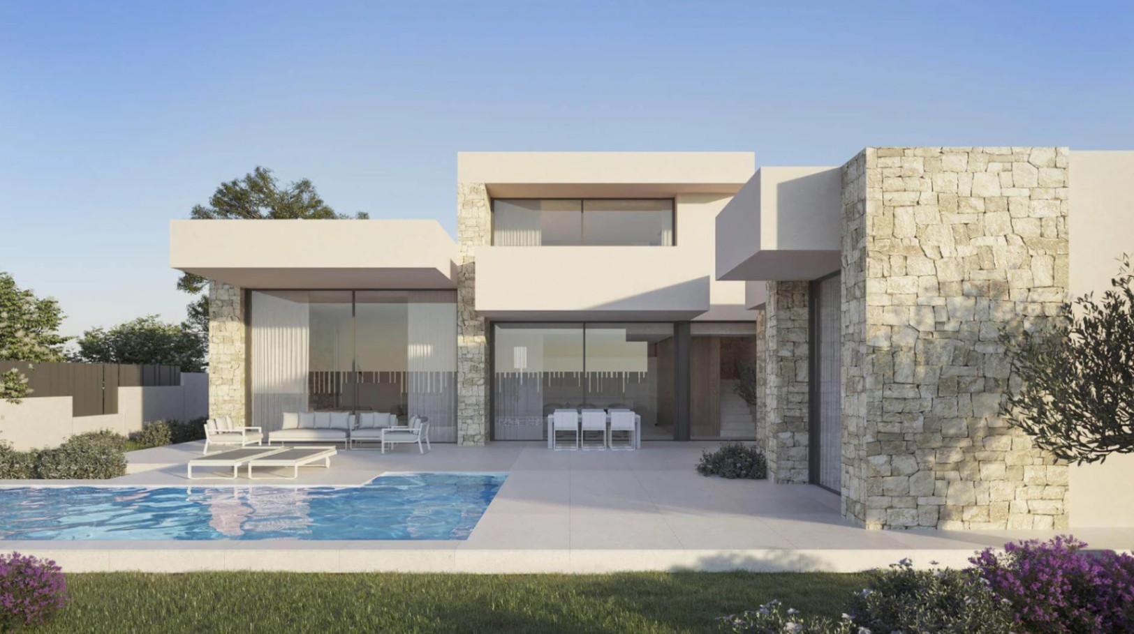 Modern two-story villa exterior showcasing natural stone masonry, a private pool, and a tiled terrace with lounge furniture under clear skies.