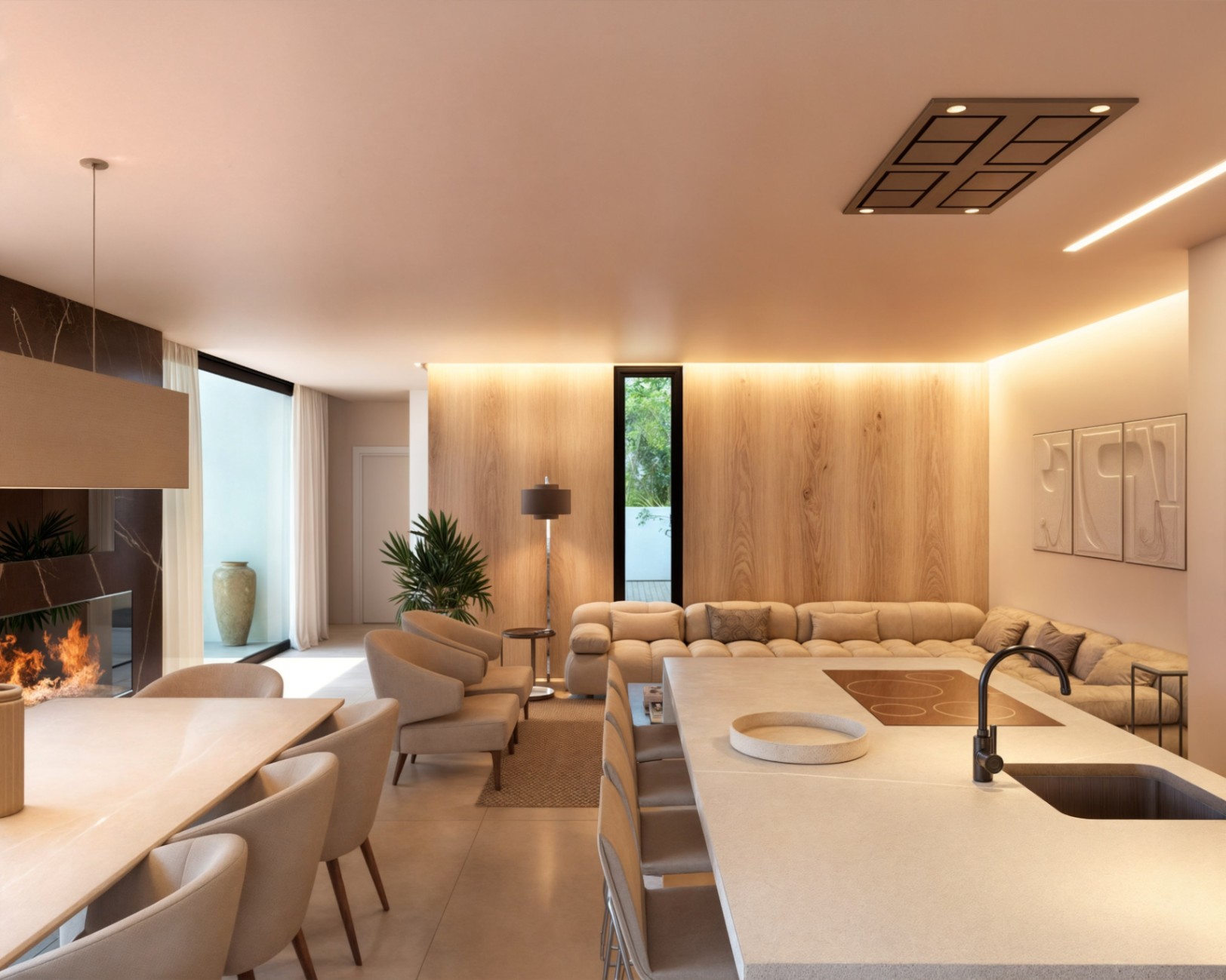 Open-plan living space featuring a stone kitchen island, a dining area with a marble fireplace, and a lounge with wood-paneled walls and cove lighting.