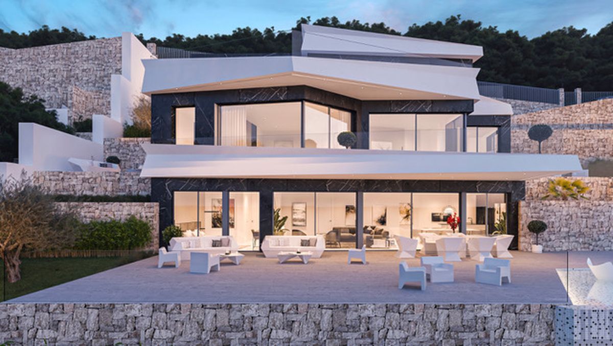 Modern multi-level villa featuring dark marble cladding, white geometric overhangs, and expansive glass facades overlooking a spacious terrace with contemporary white furniture.