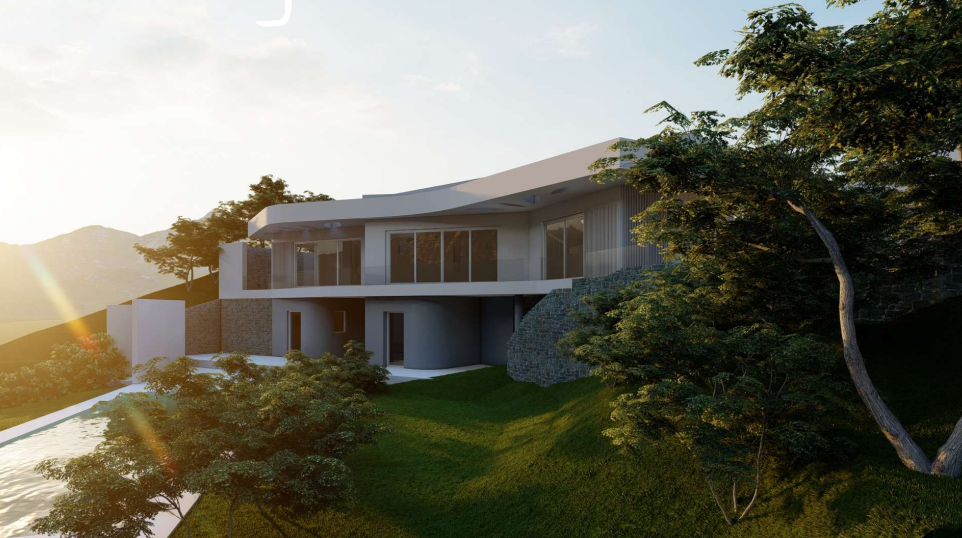 Modern two-story villa with a curved roofline, stone retaining walls, and floor-to-ceiling glass windows overlooking a sloped garden at sunset.