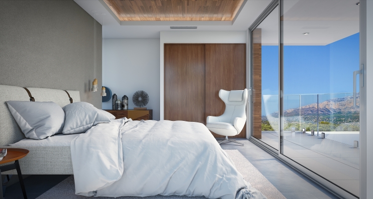 Modern bedroom featuring a wooden ceiling inlay, built-in wardrobes, and floor-to-ceiling glass doors opening onto a terrace with mountain views.