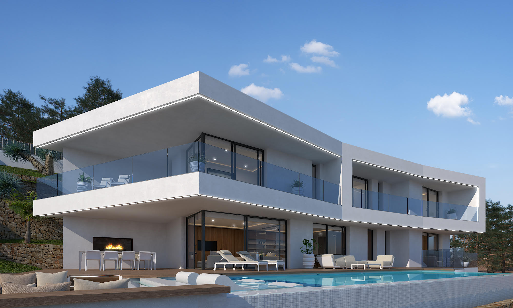 Exterior view of the villa featuring a white mosaic pool and terrace with fireplace.